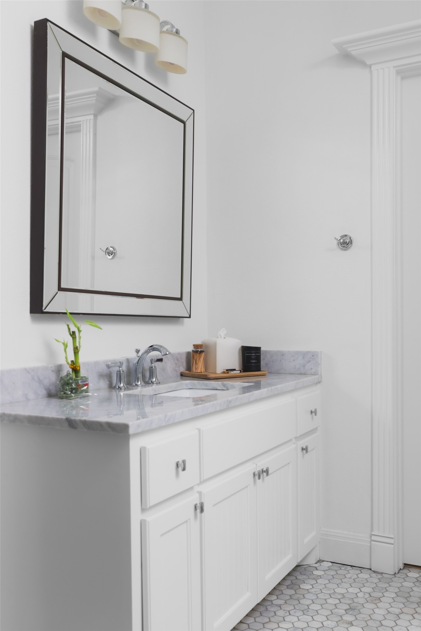1711 West 29th Street, Unit 2 Austin, TX 78703 - Photo 4 of 6 a bathroom with a granite countertop sink vanity and mirror