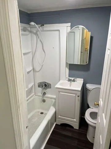 a bathroom with a sink a toilet and a bathtub