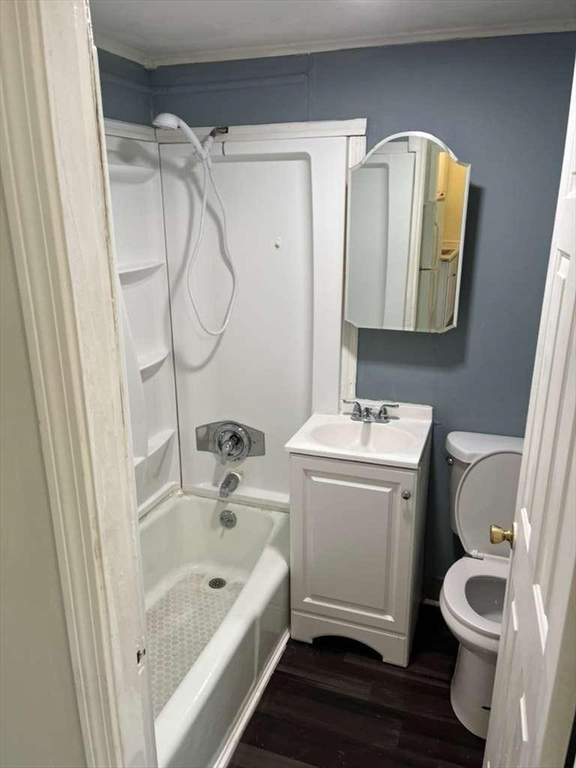 166 Hall Street, Unit 2 Fall River, MA 02724 - Photo 2 of 5 a bathroom with a sink a toilet and a bathtub