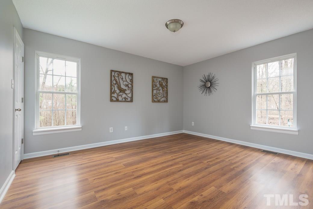 722 Rochester Street Durham, NC 27704 - Photo 6 of 9 This wonderful Master bedroom is move in ready featuring NEW PAINT AND NEW FLOORING! It has a SPACIOUS WALK IN CLOSET and two large windows overlooking the beautiful hardwood trees. Quiet and clean, a perfect place to sleep peacefully and dream.