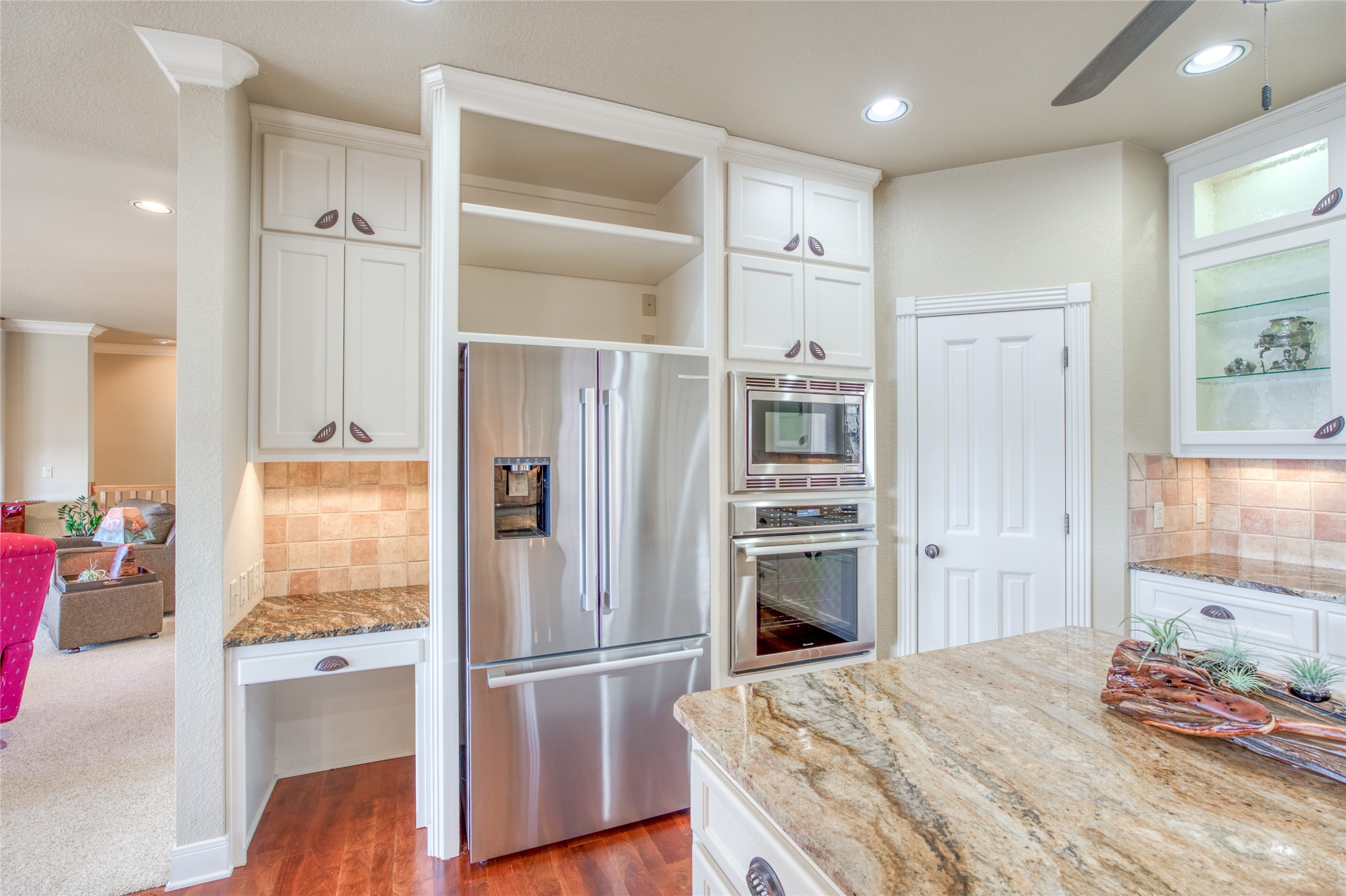 604 North Inwood Road Buchanan Dam, TX 78611 - Photo 12 of 35 a kitchen with a refrigerator and a refrigerator