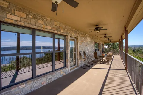 a view of a porch with a chandelier