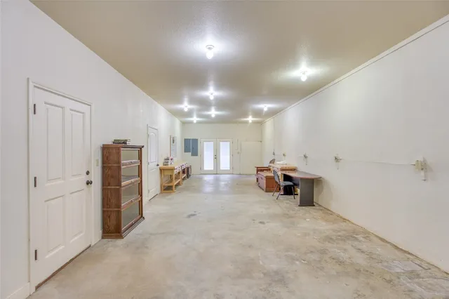 a view of a livingroom with furniture and a ceiling fan