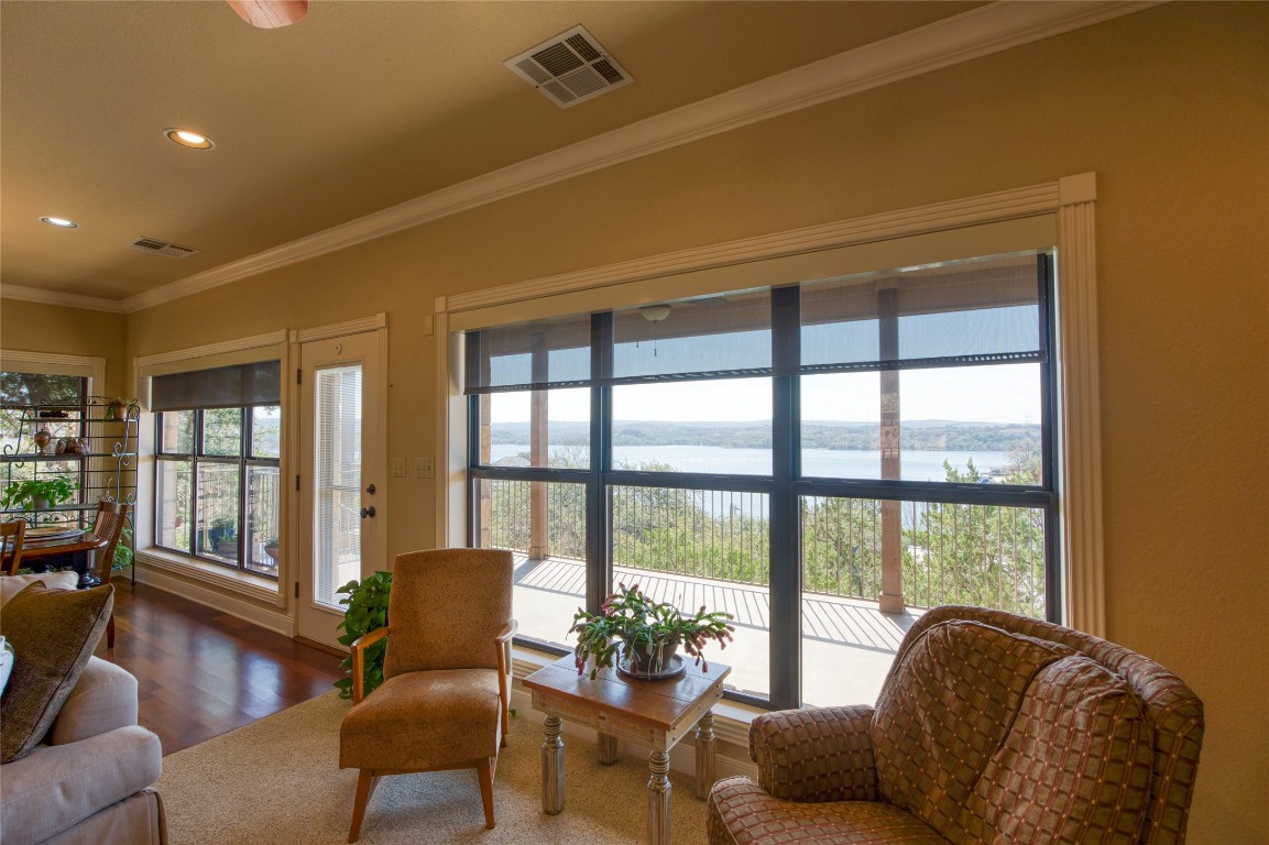 604 North Inwood Road Buchanan Dam, TX 78611 - Photo 6 of 35 Living area a gas fireplace and incredible views.