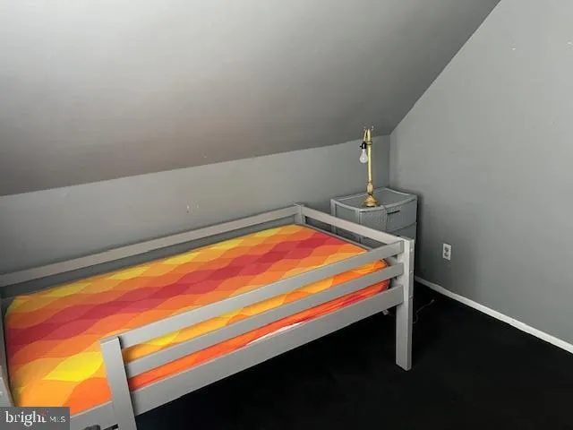 a room with pool table and a window