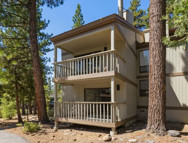a view of a yard with a deck