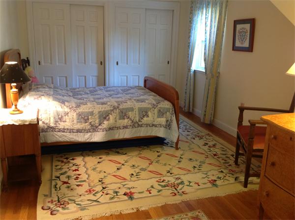 30 Ginn Road Winchester, MA 01890 - Photo 14 of 26 a bed sitting in a spacious bedroom next to a window