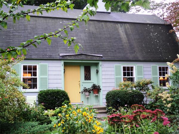 30 Ginn Road Winchester, MA 01890 - Photo 2 of 26 a front view of house with a yard and potted plants