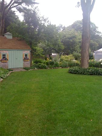30 Ginn Road Winchester, MA 01890 - Photo 24 of 26 a view of a house with a yard
