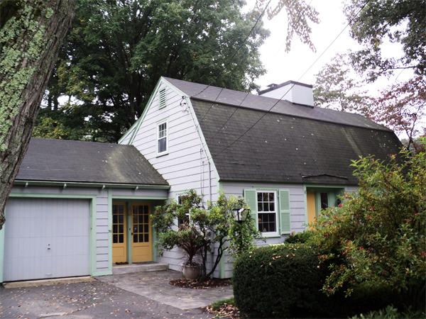 30 Ginn Road Winchester, MA 01890 - Photo 3 of 26 a house with lots of trees in the background