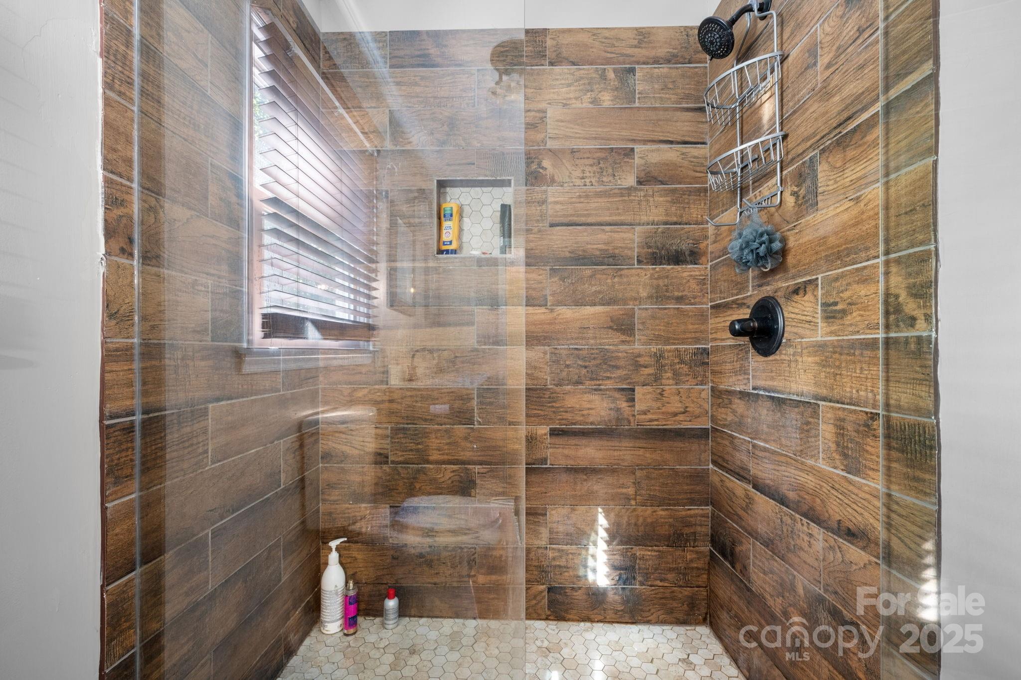 3399 Harvard Place Hudson, NC 28638 - Photo 21 of 30 a bathroom with a shower
