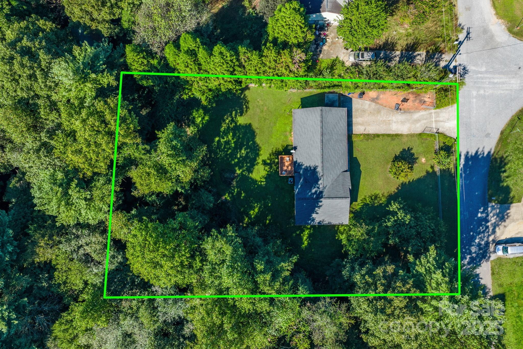 3399 Harvard Place Hudson, NC 28638 - Photo 29 of 30 an aerial view of a house with a garden