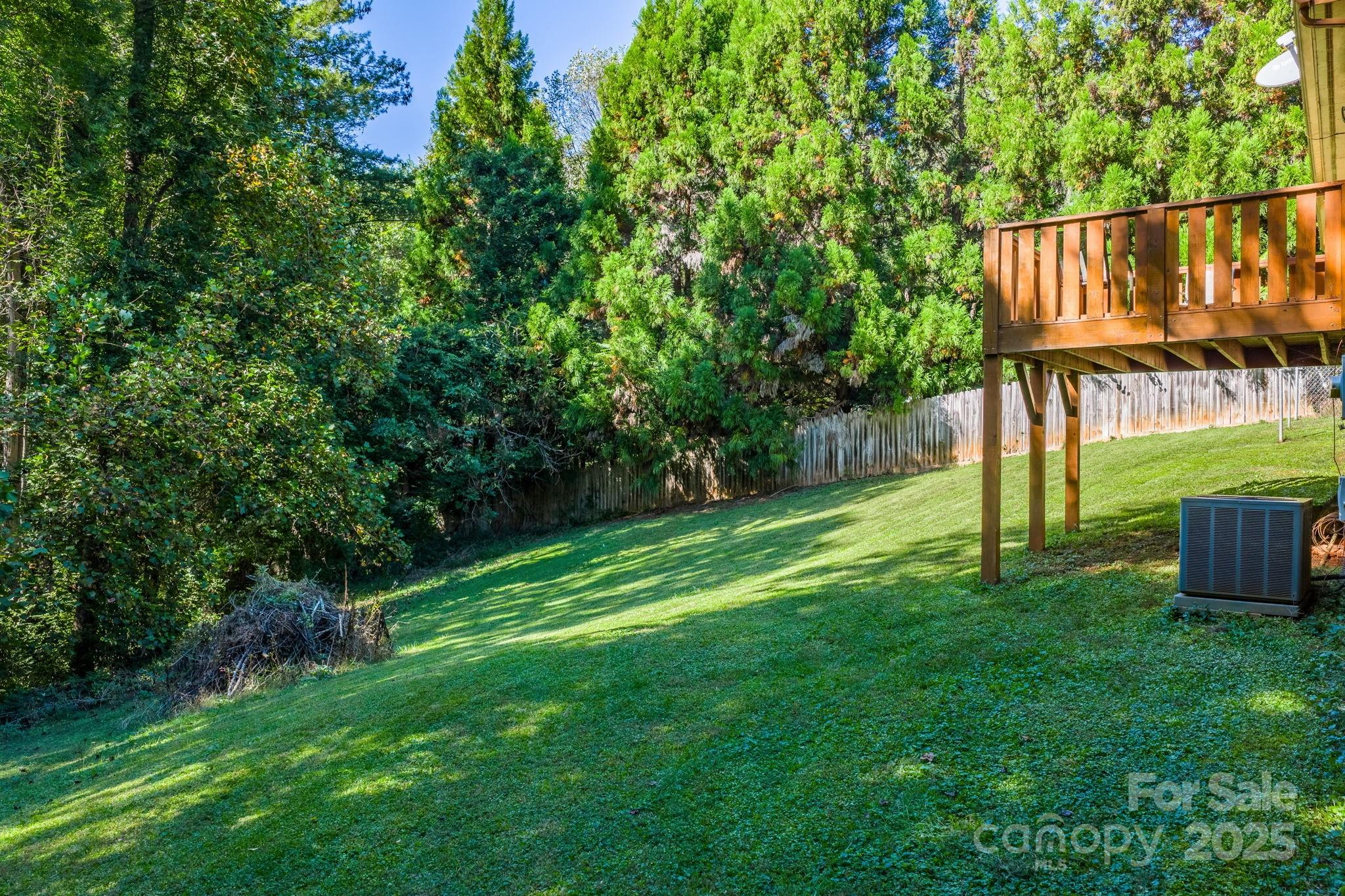 3399 Harvard Place Hudson, NC 28638 - Photo 30 of 30 a view of an house with backyard space and a lake view