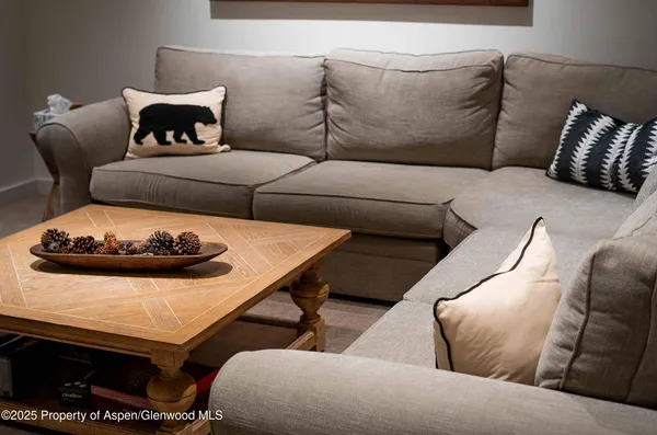 a living room with furniture and a couch