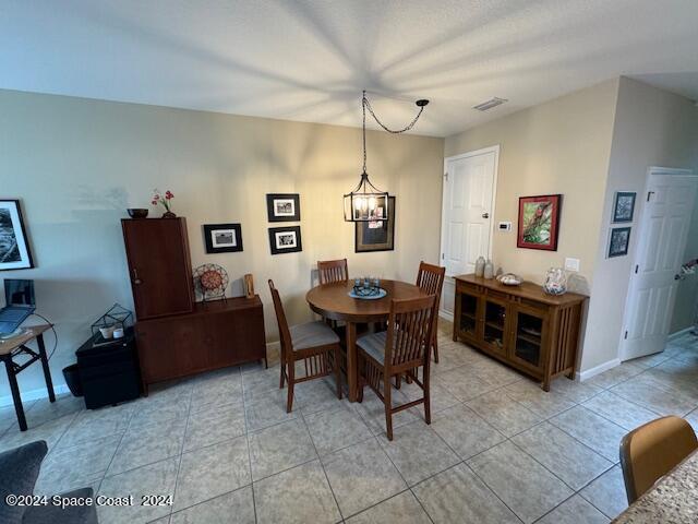 2780 Reston Street, Unit 106 Melbourne, FL 32935 - Photo 12 of 24 a living room with furniture a desk and chair
