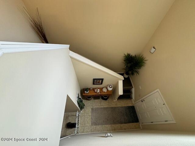 2780 Reston Street, Unit 106 Melbourne, FL 32935 - Photo 15 of 24 a view of staircase with a small entryway