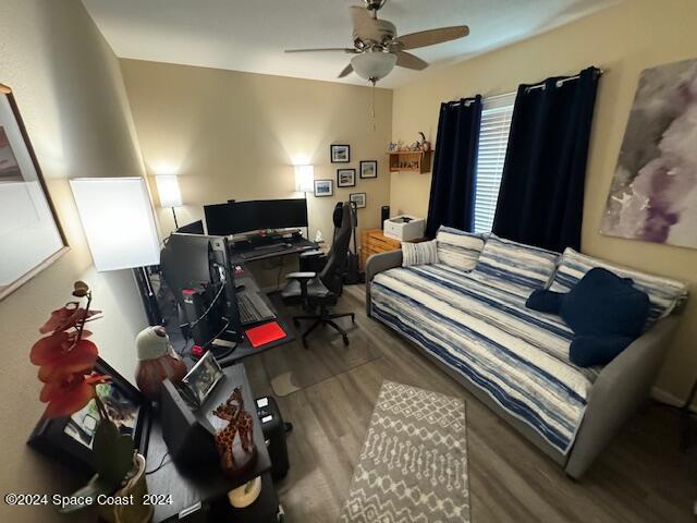 2780 Reston Street, Unit 106 Melbourne, FL 32935 - Photo 23 of 24 a bedroom with a bed closet and a mirror