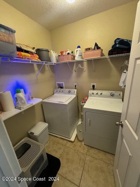 2780 Reston Street, Unit 106 Melbourne, FL 32935 - Photo 24 of 24 a utility room with dryer and washer