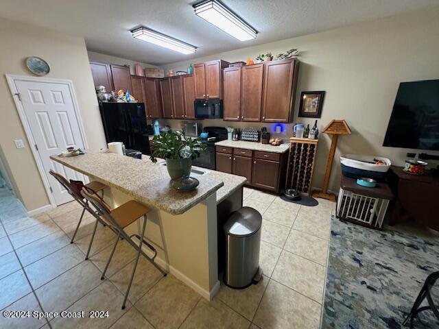 2780 Reston Street, Unit 106 Melbourne, FL 32935 - Photo 8 of 24 a view of a dining room with furniture