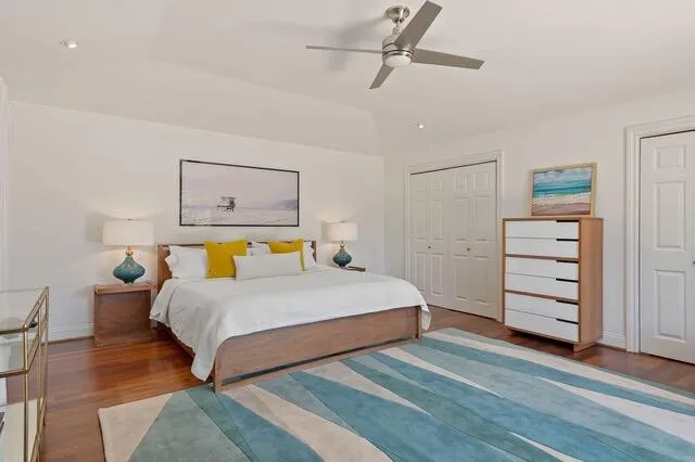 a bedroom with a bed and closet