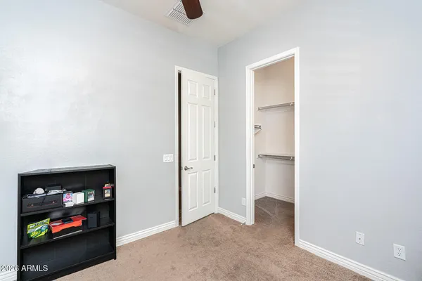 a view of storage and utility room with washer and dryer