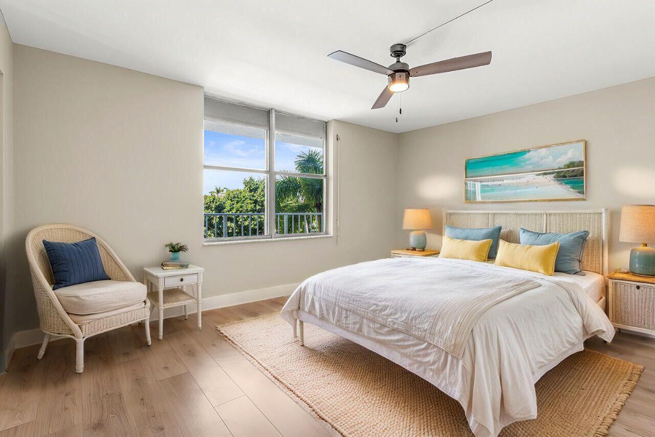 1 Harbourside Drive, Unit 1301 Delray Beach, FL 33483 - Photo 11 of 13 a bedroom with a bed and windows