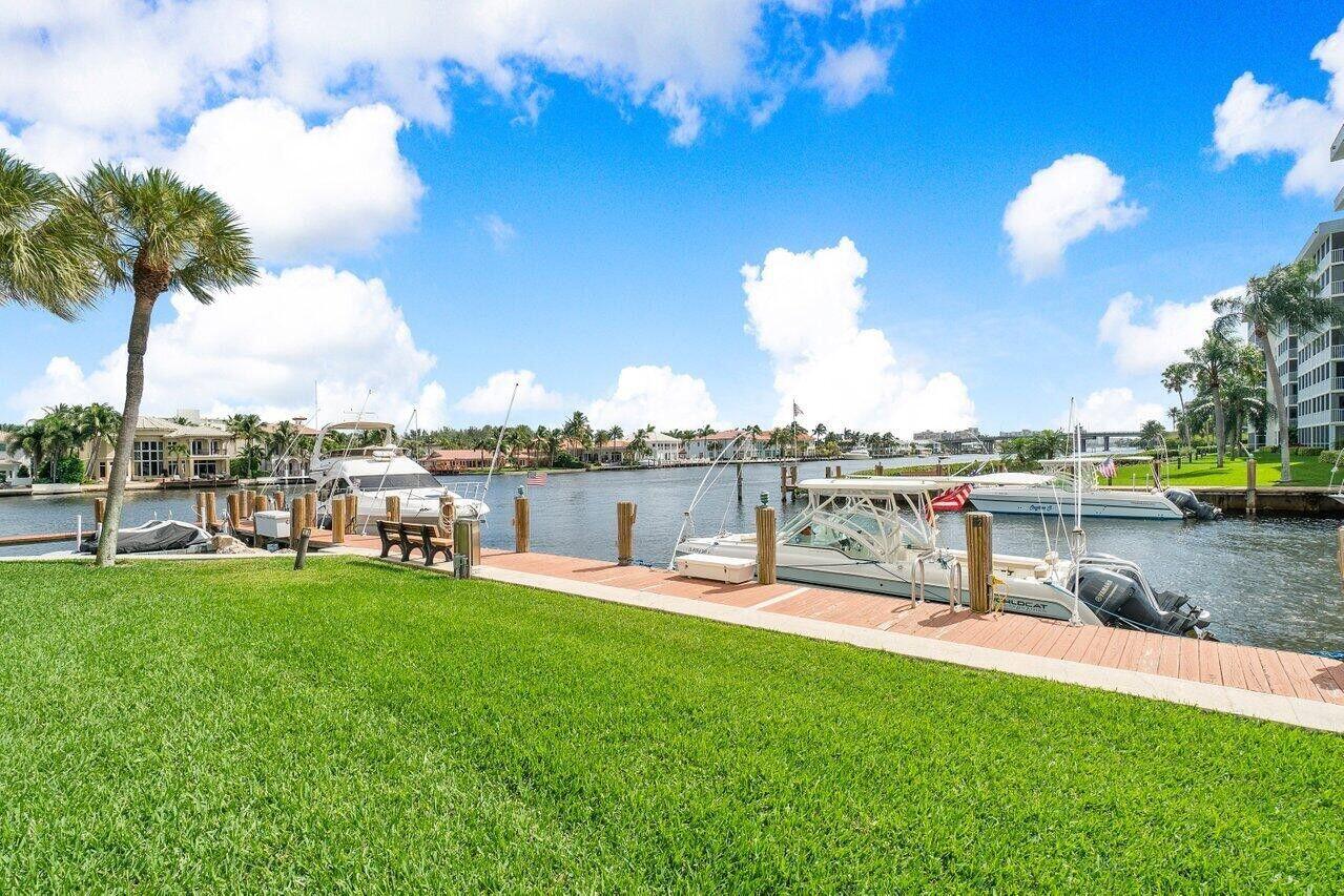 1 Harbourside Drive, Unit 1301 Delray Beach, FL 33483 - Photo 13 of 13 a view of a lake with houses