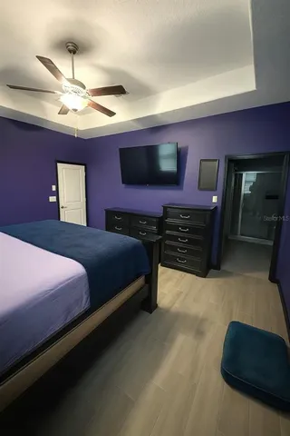 a bathroom with a tub a sink and mirror