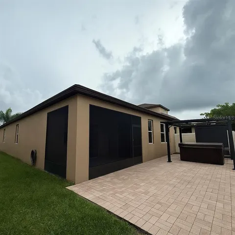 a house with palm tree in front of it