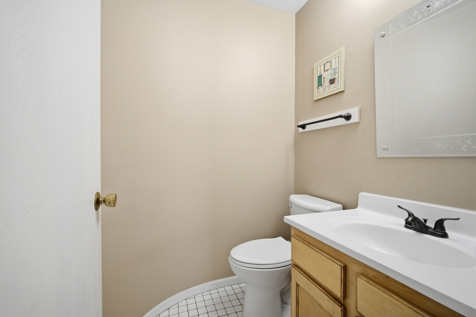 1264 Huntington Drive Mundelein, IL 60060 - Photo 27 of 32 a bathroom with a sink and a toilet