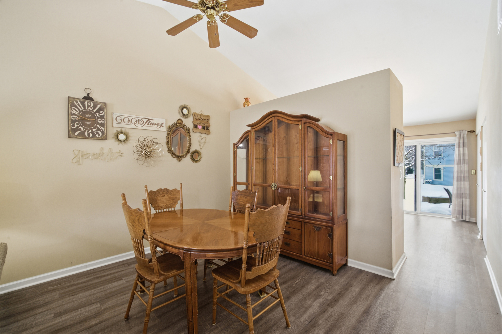 1264 Huntington Drive Mundelein, IL 60060 - Photo 9 of 32 a view of a dining room with furniture and wooden floor