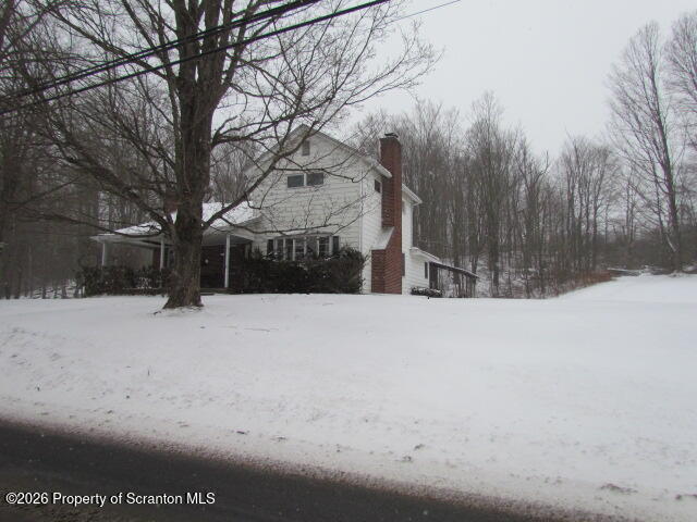691 Madisonville Road Moscow, PA 18444 - Photo 1 of 33 a view of snow on the road