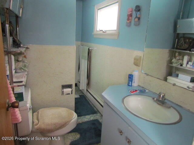 691 Madisonville Road Moscow, PA 18444 - Photo 14 of 33 a bathroom with a sink toilet and mirror