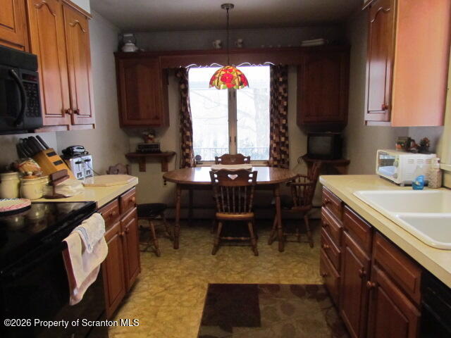 691 Madisonville Road Moscow, PA 18444 - Photo 17 of 33 a kitchen with a sink and a stove top oven