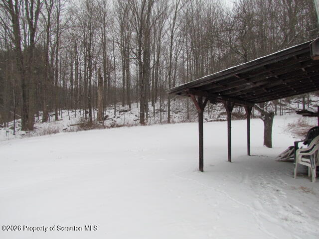 691 Madisonville Road Moscow, PA 18444 - Photo 26 of 33 a view of patio with a bench