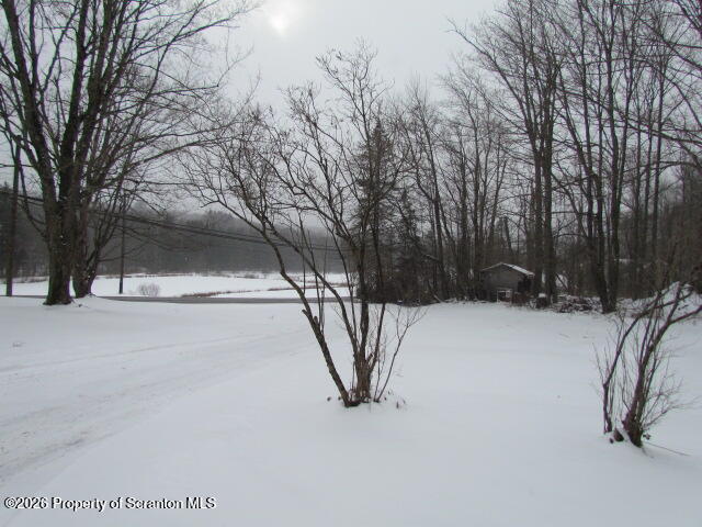 691 Madisonville Road Moscow, PA 18444 - Photo 29 of 33 a view of water with a building in the background