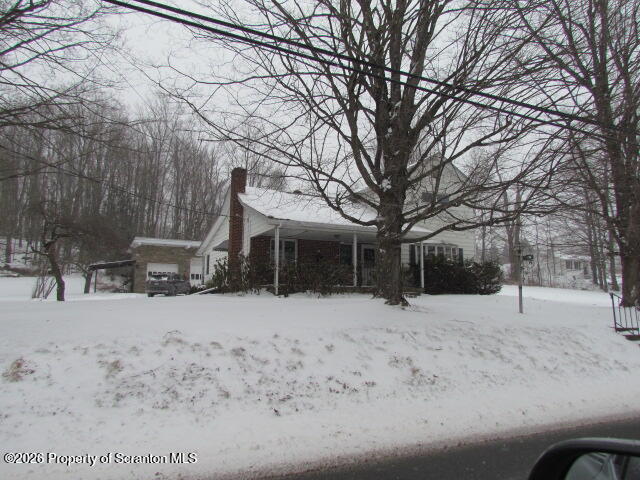 691 Madisonville Road Moscow, PA 18444 - Photo 32 of 33 a view of snow covered with snow in front of house