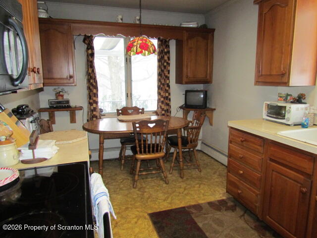 691 Madisonville Road Moscow, PA 18444 - Photo 4 of 33 a view of a dining room with furniture