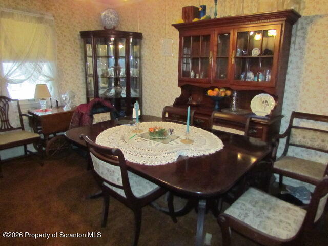 691 Madisonville Road Moscow, PA 18444 - Photo 8 of 33 a view of a dining room with furniture and chandelier