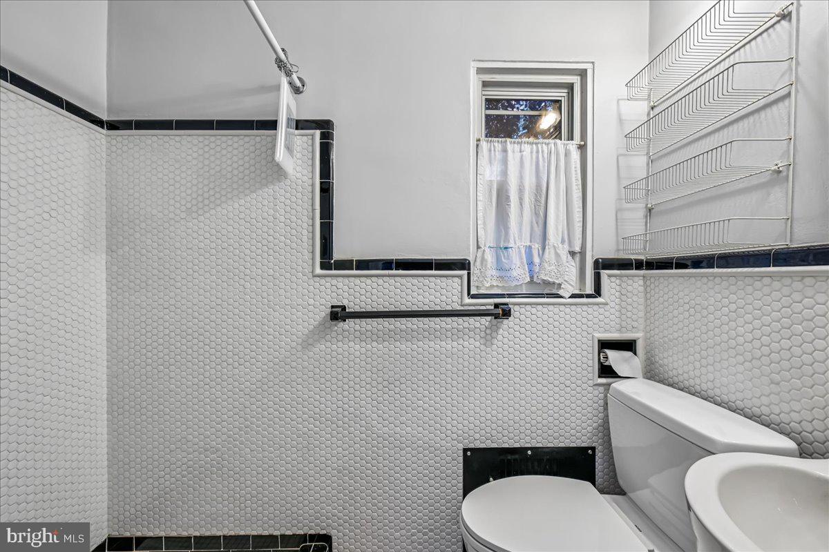 3201 Circle Hill Road Alexandria, VA 22305 - Photo 19 of 37 main floor bathroom off bedroom/office