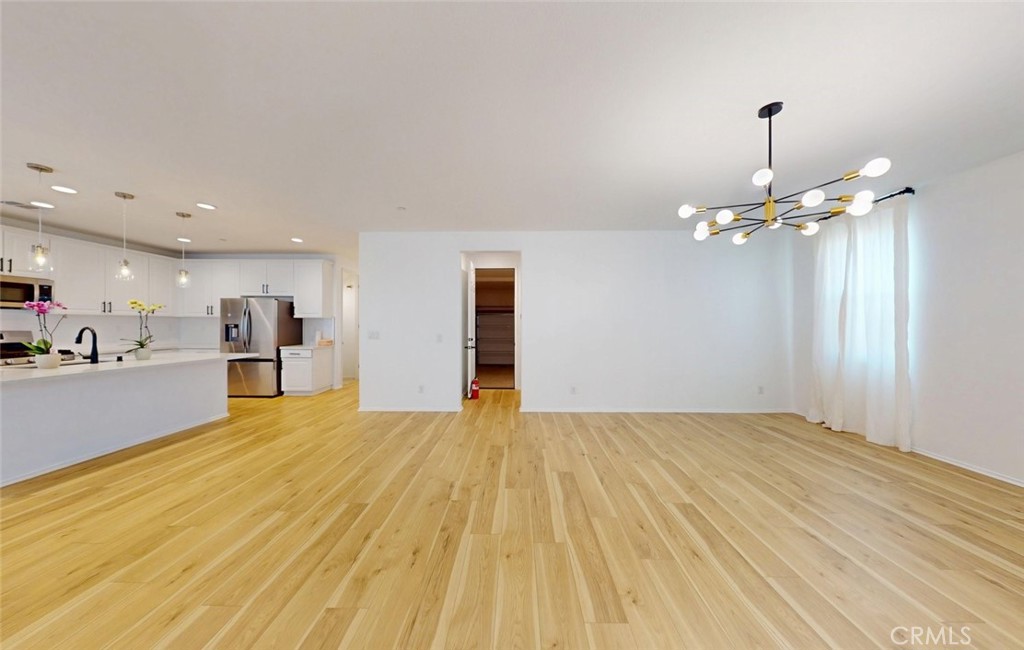 340 Lilly Rialto, CA 92376 - Photo 18 of 50 a view of a livingroom with a chandelier