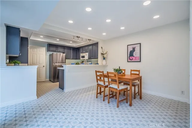 a bathroom with a sink mirror toilet and bathtub