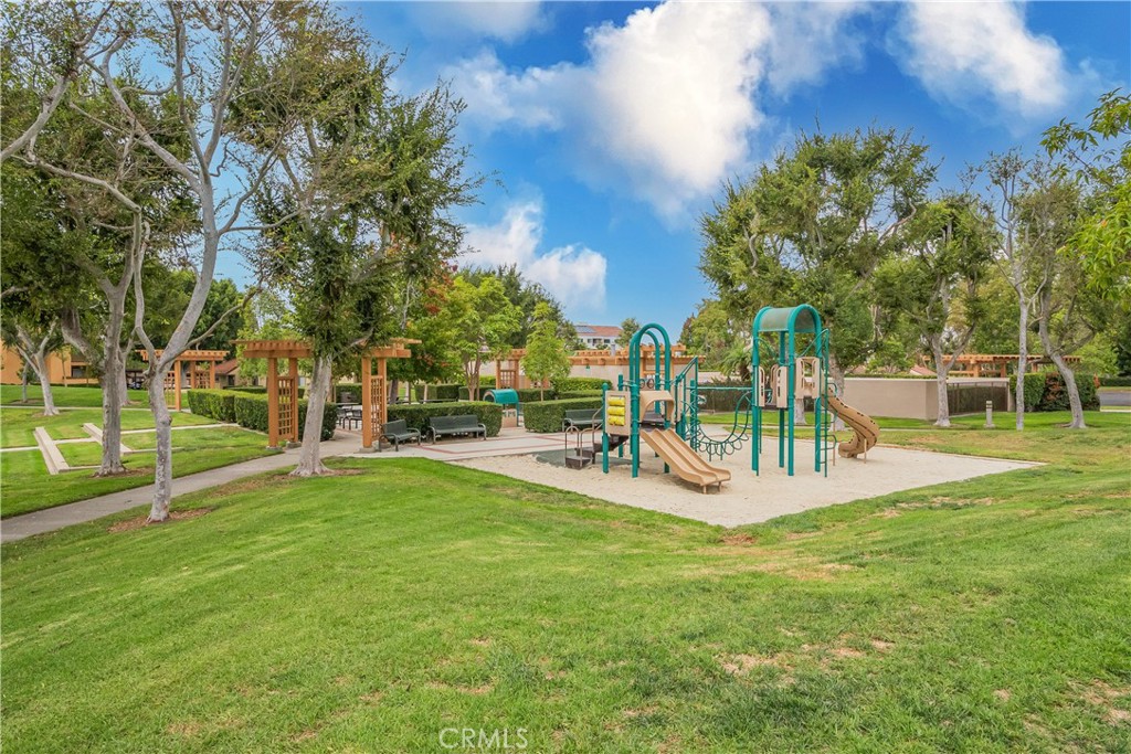 19 Dartmouth Irvine, CA 92612 - Photo 31 of 44 a view of a park with swings and slides