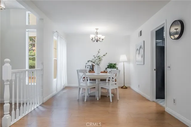 a kitchen with stainless steel appliances granite countertop a refrigerator sink and cabinets