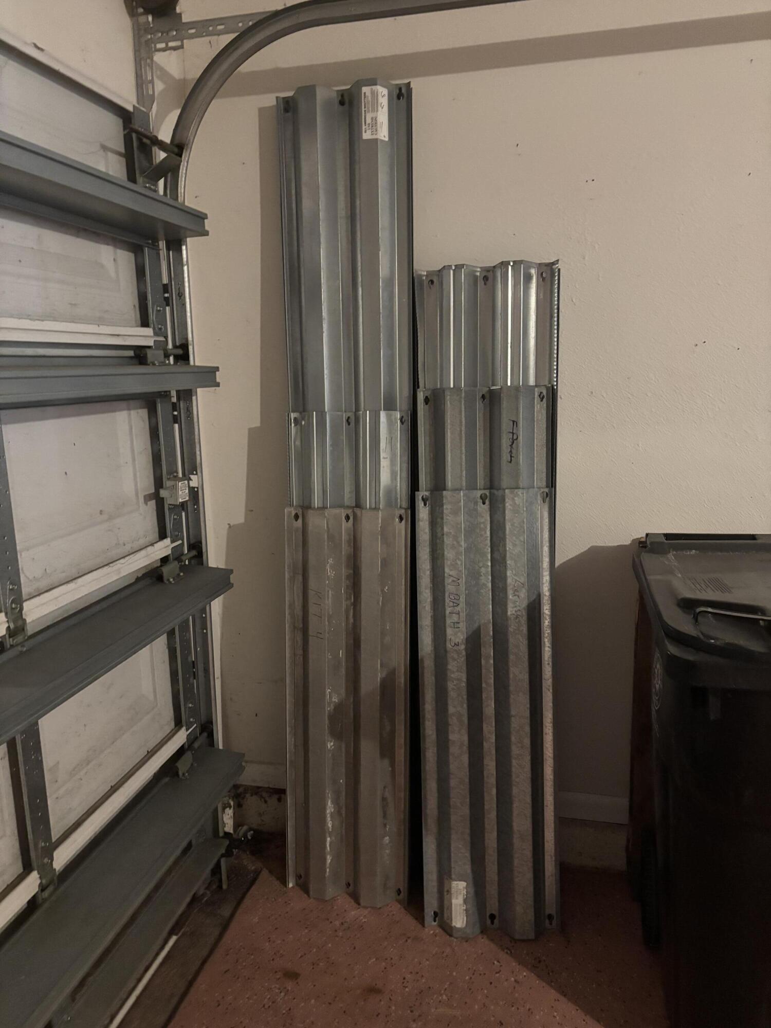 380 Southwest Undallo Road Port St. Lucie, FL 34953 - Photo 16 of 16 Hurricane shutters in the garage