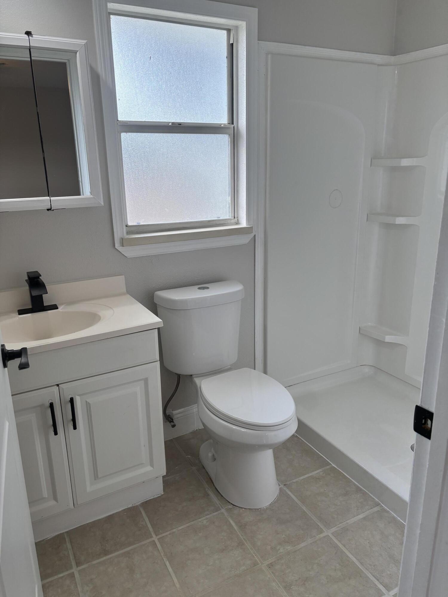 380 Southwest Undallo Road Port St. Lucie, FL 34953 - Photo 9 of 16 Master bathroom