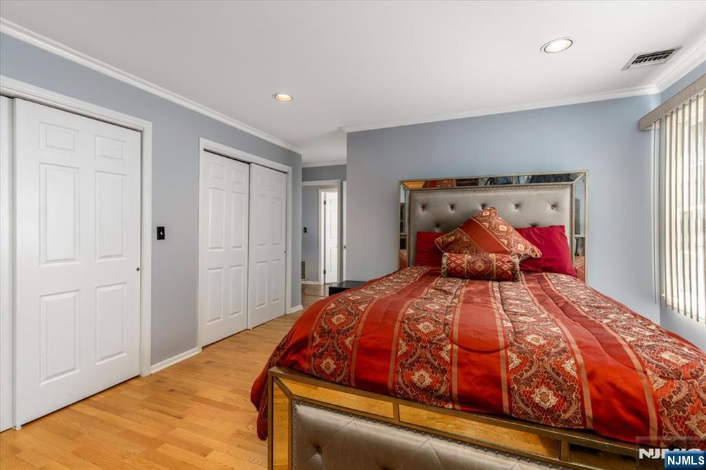 2 Crystal Lane, Unit 294 Paterson, NJ 07501 - Photo 12 of 30 a bedroom with a bed and window