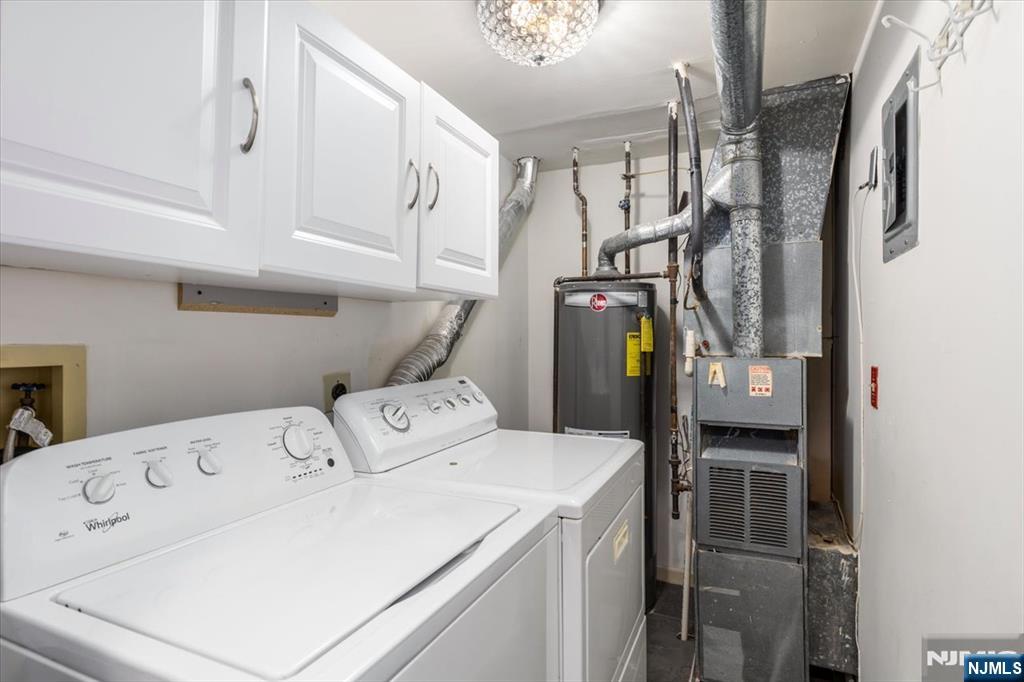 2 Crystal Lane, Unit 294 Paterson, NJ 07501 - Photo 21 of 30 a utility room with dryer and washer