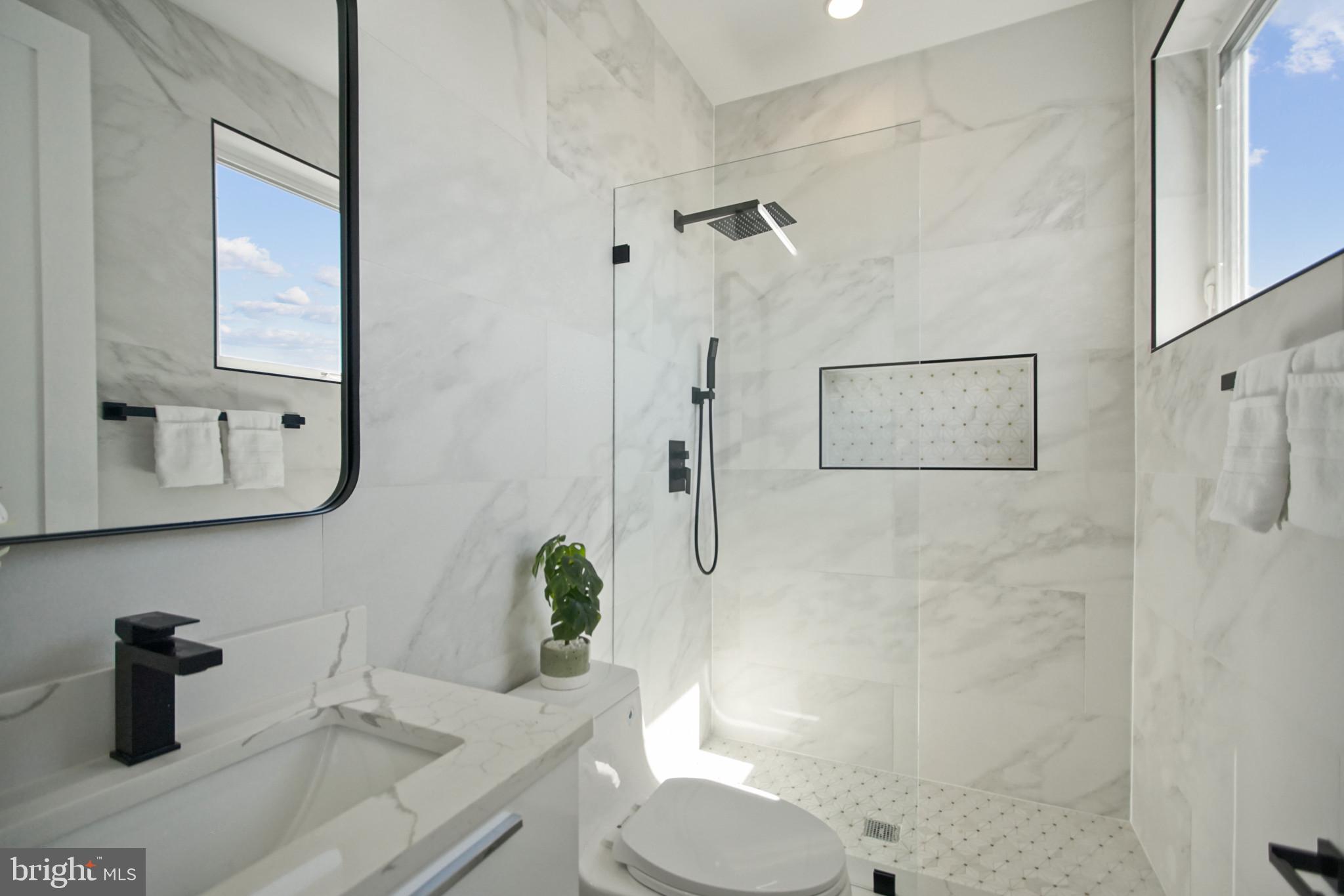623 Florida Avenue Northeast, Unit PH2 Washington, DC 20002 - Photo 18 of 32 White quatz bathroom