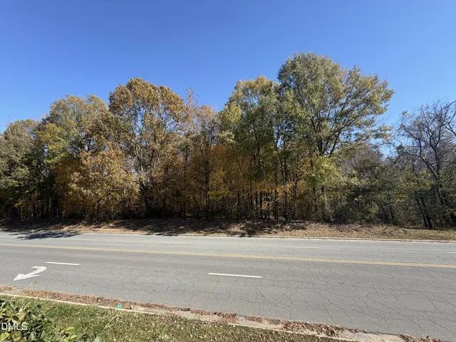 a view of swimming pool with a yard